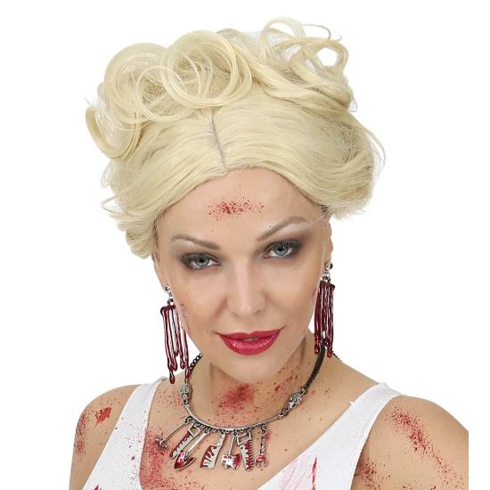 Colar de ferramentas sangrentas.