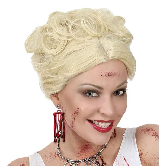 Par de brincos de sangue pingando.