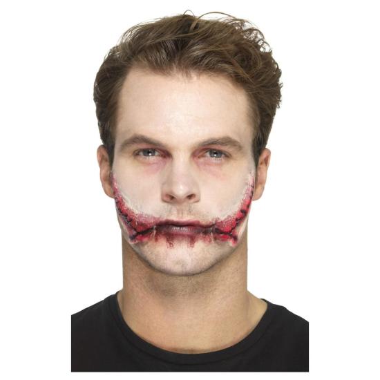 Prótese bucal de látex costurada